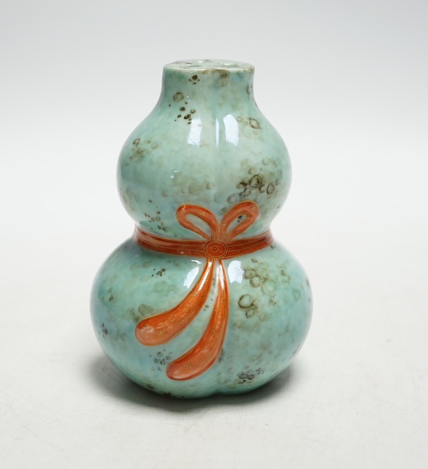 A Chinese enamelled porcelain gourd posy vase, 10cms high